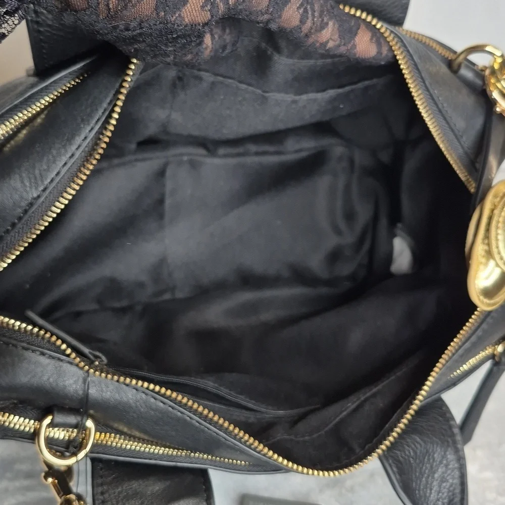 Vince Camuto Black Leather Handbag with Gold Accents